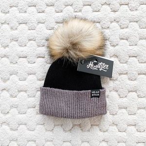NWT Headster Baby Pom Toque. Lined with fleece. Size 0-6 months.